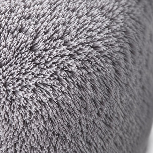 A macro photograph of the grey plush cover on the Ondine Classique, filling the square frame with th